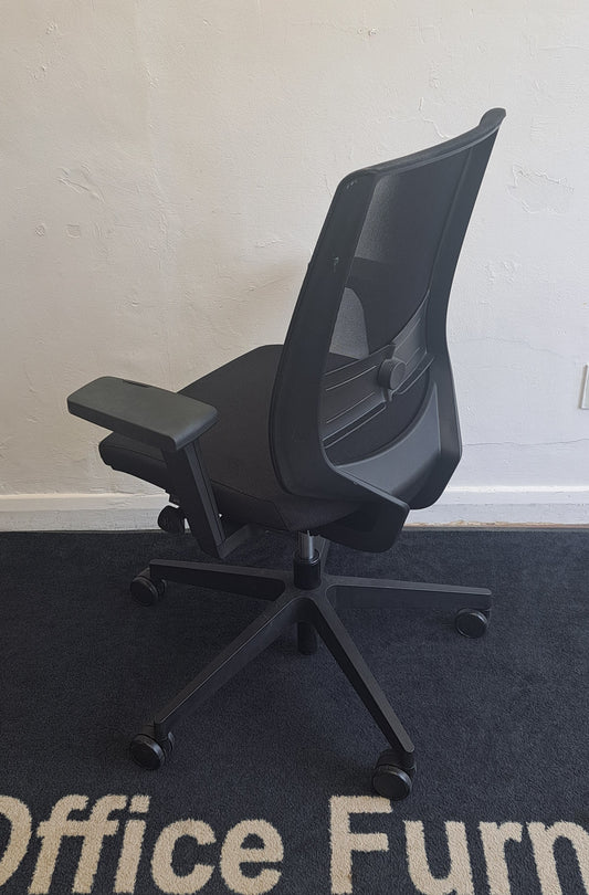 Black mesh fully adjustable operator chairs